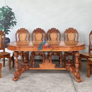 Bàn ăn căm xe oval lớn 8 ghế trụ sư tử
