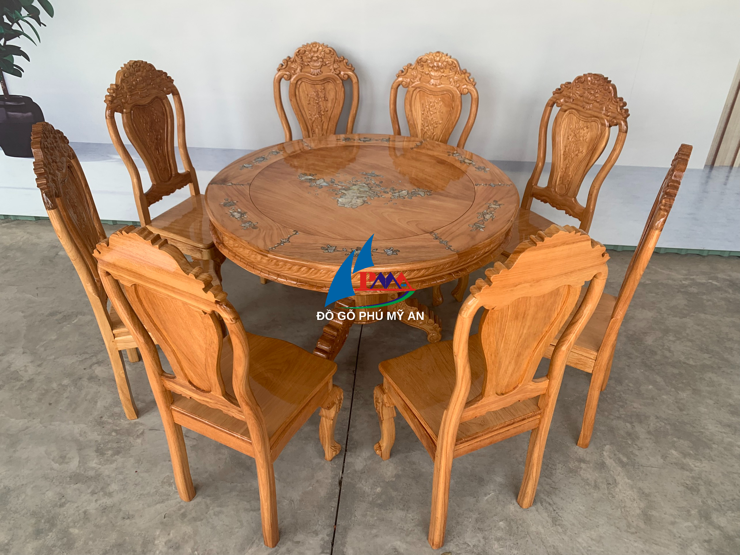 Bàn ăn gõ tròn 8 ghế cẩn